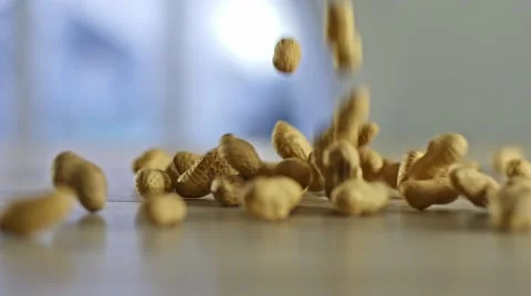 Peanuts Falling Down, Dolly Shot Stock Footage 46711068