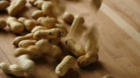 Peanuts falling in slow motion Stock Footage 51703378