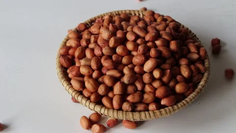 Peanuts isolated on white background close up organic healthy food concept Stock Footage 154680637