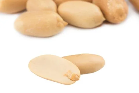 Peanuts isolated on the white background. Close up Stock Photos