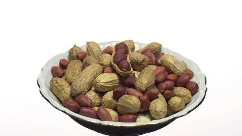 Peanuts. Mixed Peanuts in rotation. Snack closeup.  Isolated on white. Stock Footage 102281561