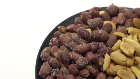 Peanuts. Mixed Peanuts in rotation. Snack closeup.  Isolated on white. Stock Footage 102291342