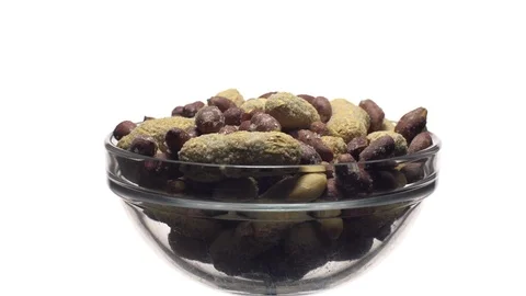 Peanuts. Mixed Peanuts in rotation. Snack closeup.  Isolated on white. Stock Footage 102339377