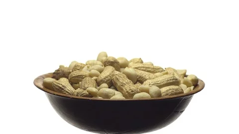 Peanuts. Mixed Peanuts in rotation. Snack closeup.  Isolated on white. Stock Footage 102340345
