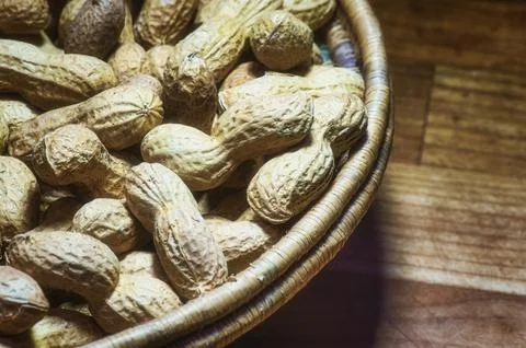 Peanuts in natural bowl Stock Photos