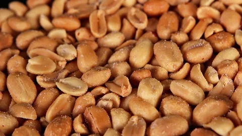 Peanuts, peanut rotating closeup texture pattern background Stock Footage 97245309