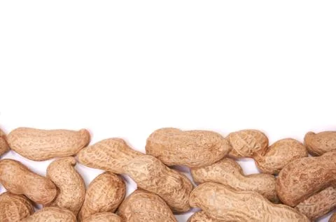 Peanuts in a peel on a white background isolate Stock Photos