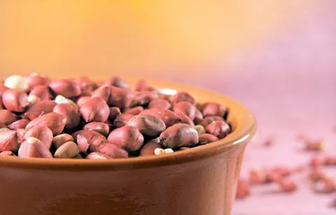 Peanuts in red shell Stock Photos