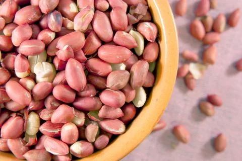 Peanuts in red shell Stock Photos