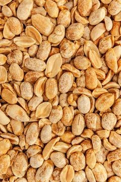 Peanuts Roasted peanuts in closeup on the white background Copyright: xZoo... Foto stock