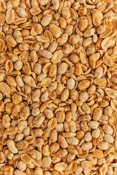 Peanuts Roasted peanuts in closeup on the white background Copyright: xZoo... Foto stock