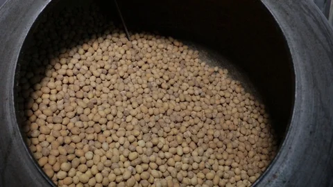 Peanuts rotating in machine Stock Footage 118976305