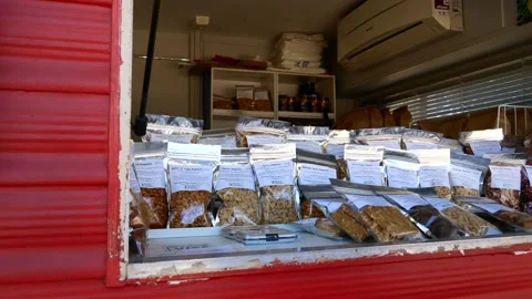 Peanuts samplers in a red wagon in Australia Stock Footage 153782967