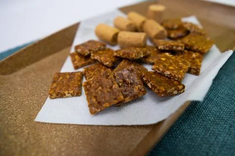 Peanuts in the shape of sweets, pacoca, cornmeal cake and peanut butter on bread Foto stock