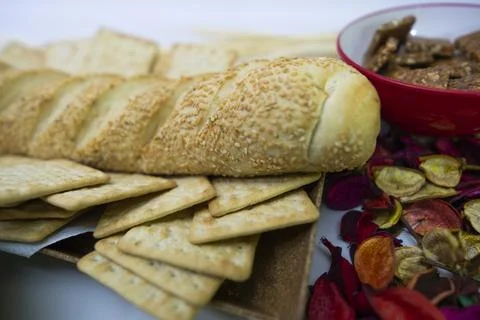 Peanuts in the shape of sweets, pacoca, cornmeal cake and peanut butter on bread Stock Photos