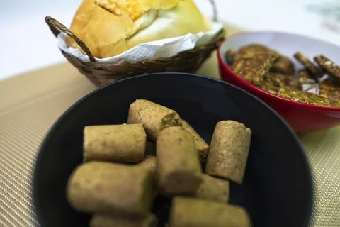 Peanuts in the shape of sweets, pacoca, cornmeal cake and peanut butter on bread Foto stock