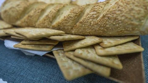 Peanuts in the shape of sweets, paçoca, cornmeal cake and peanut butter on bre Foto stock