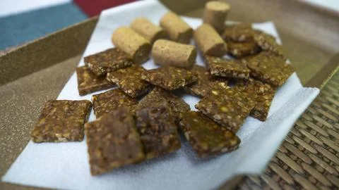 Peanuts in the shape of sweets, pacoca, cornmeal cake and peanut butter - Foto stock