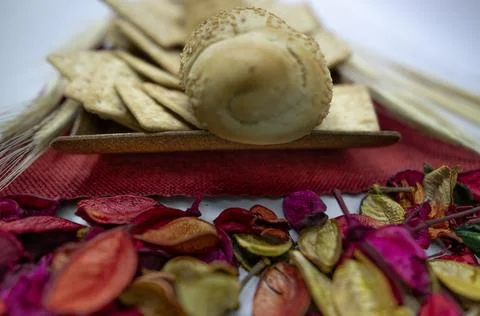 Peanuts in the shape of sweets, paoca, cornmeal cake and peanut butter on bre Stock Photos