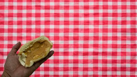 Peanuts in the shape of sweets, paoca, cornmeal cake and peanut butter on br- Foto stock