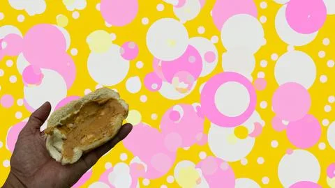 Peanuts in the shape of sweets, paoca, cornmeal cake and peanut butter on br- Stock Photos