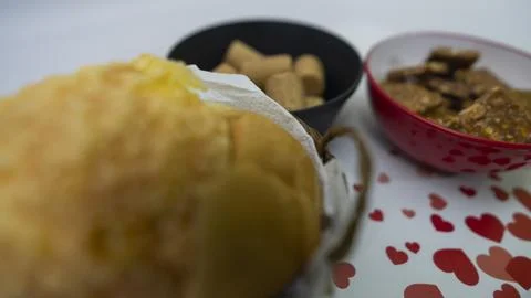 Peanuts in the shape of sweets, paoca, cornmeal cake and peanut butter on - Stock Photos