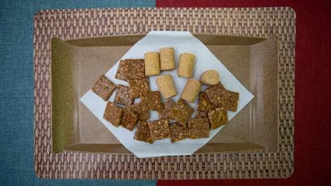 Peanuts in the shape of sweets, paoca, cornmeal cake and peanut butter on - Stock Photos