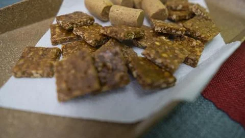 Peanuts in the shape of sweets, paoca, cornmeal cake and peanut butter on - Stock Photos