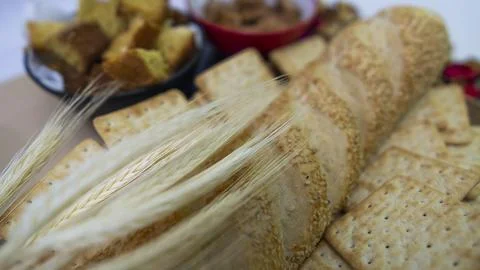 Peanuts in the shape of sweets, paoca, cornmeal cake and peanut butter on - Stock Photos