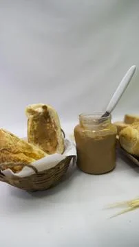 Peanuts in the shape of sweets, paoca, cornmeal cake and peanut butter on - Stock Photos