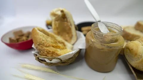 Peanuts in the shape of sweets, paoca, cornmeal cake and peanut butter on -- Stock Photos