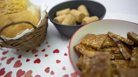 Peanuts in the shape of sweets, paoca, cornmeal cake and peanut butter on -- Stock Photos