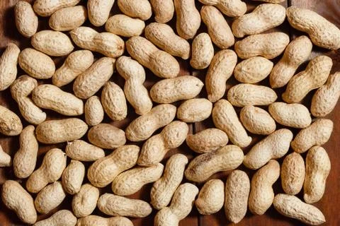 Peanuts in shell texture food background top view. Stock Photos