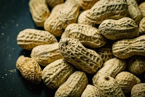 Peanuts in a shell texture for food content. Stock Photos