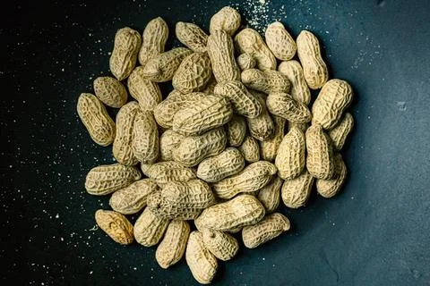 Peanuts in a shell texture for food content. Stock Photos