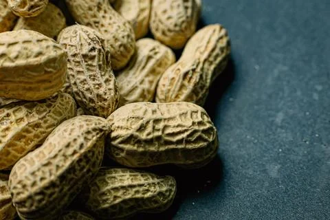Peanuts in a shell texture for food content. Фото