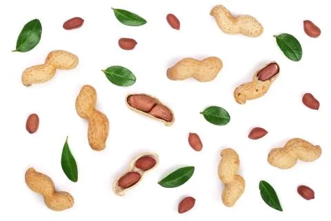 Peanuts with shells isolated on white background, top view. Flat lay pattern Stock Photos