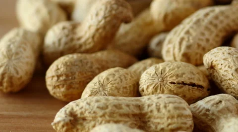Peanuts in shells, low angle rotation Stock Footage 52440850