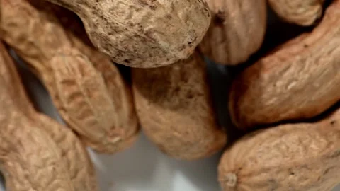 Peanuts Spinning Out of a Brown Paper Bag Stock Footage 328426328