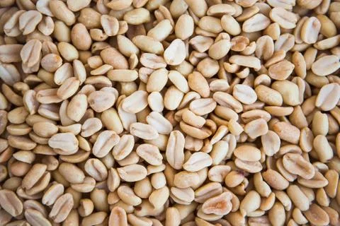 Peanuts texture. Background of arachis. Pattern with peanuts. Stock Photos