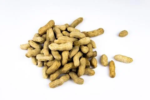 Peanuts top view on white background. Stock Photos