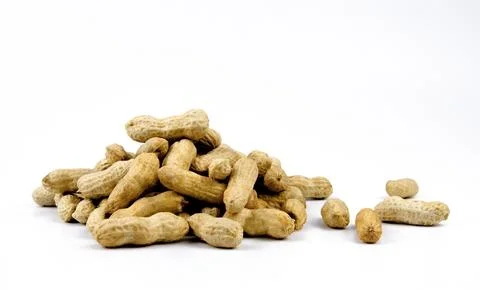 Peanuts top view on white background. Stock Photos