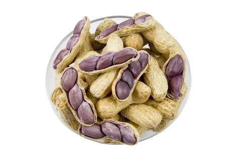 Peanuts top view on white background. Stock Photos