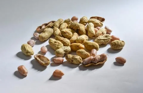 Peanuts on white background and shadow Stock Photos