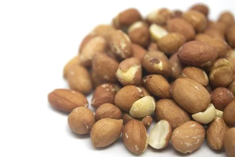 Peanuts on white background closeup image Stock Photos