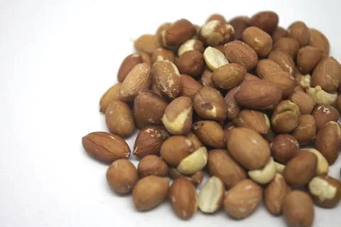 Peanuts on white background closeup image Stock Photos