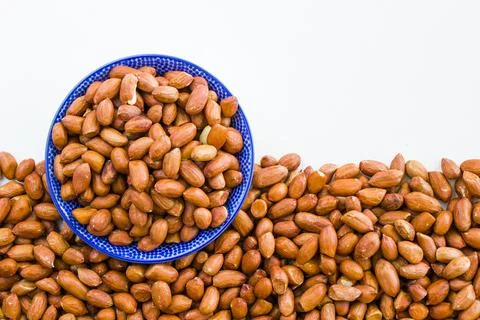 Peanuts on the white background, walnut snack Stock-Fotos
