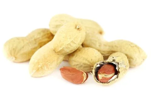 Peanuts on white Stock Photos