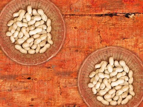 Peanuts On The Wooden Background Stock Photos