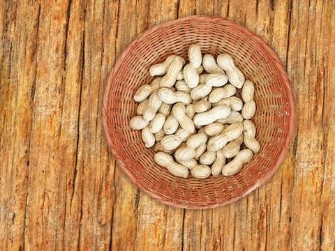 Peanuts On The Wooden Background Stock Photos